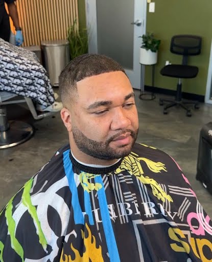 Low fade with sculpted beard